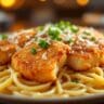 Crispy Chicken Fritta served at Olive Garden with creamy Alfredo pasta